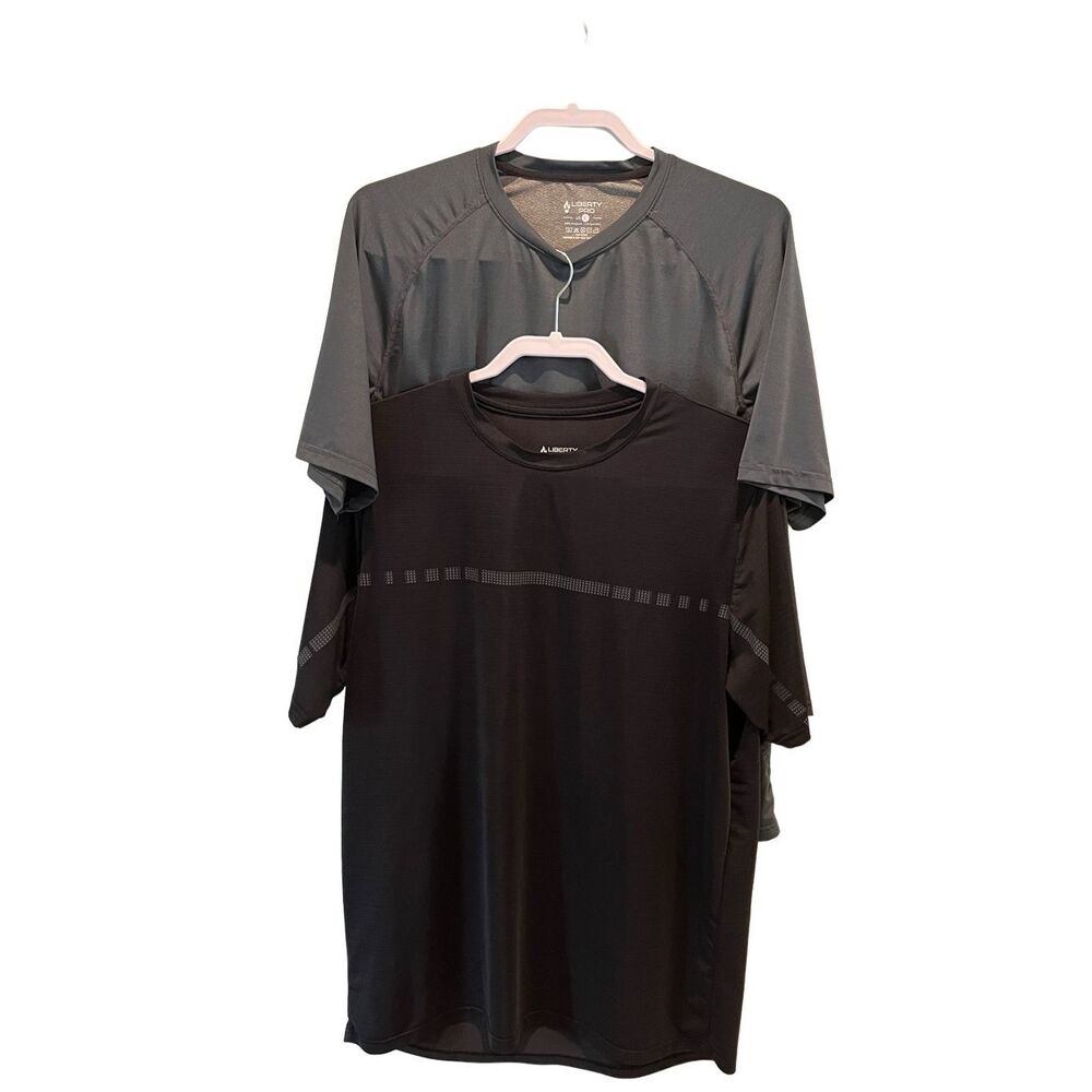 (2) Liberty Pro performance t-shirts (1) charcoal gray and (1) black - L